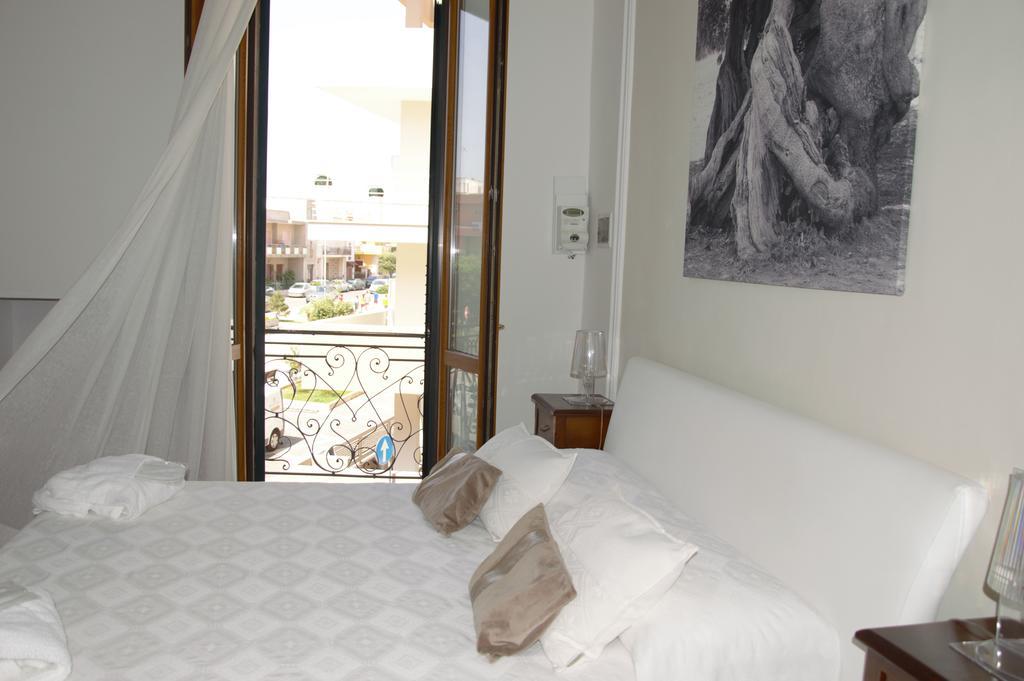 Hotel L'Angulus Ridet Porto Cesareo Exterior foto